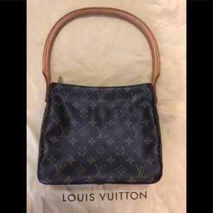 Louie Vuitton hang bag.